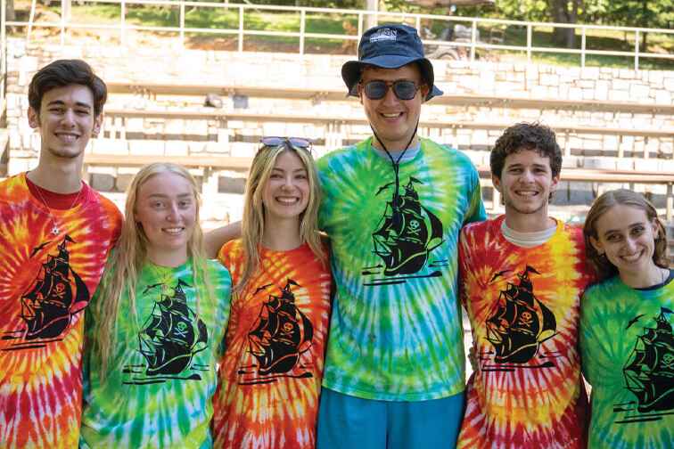 Evyatar (middle, in hat) with other camp staff